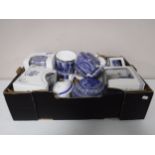A quantity of boxed and un-boxed Ringtons china - teapots, caddies,