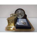 A tray of early 20th century oak cased mantel clock, three carriage clocks,