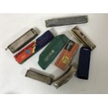 A collection of Hohner and other harmonicas (9)