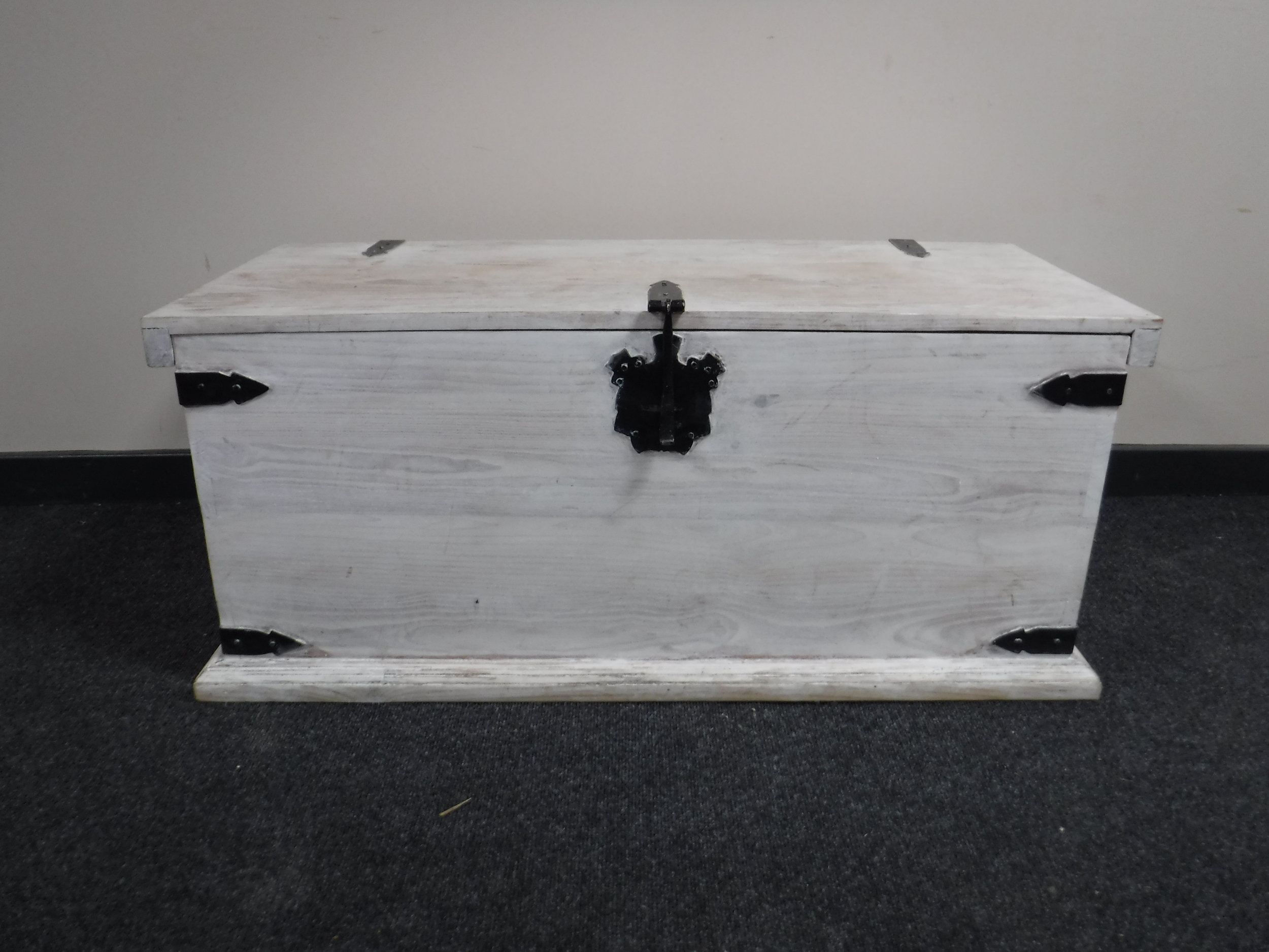 A painted pine blanket chest with metal fittings