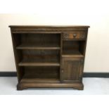 A set of Old charm open bookshelves fitted with a cupboard and drawer
