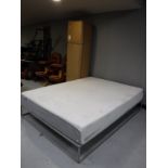 A boxed Ergoflex super king size memory foam mattress,