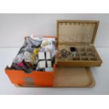A tray of three boxes of a large quantity of costume and sterling silver jewellery