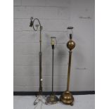Three twentieth century brass standard lamps