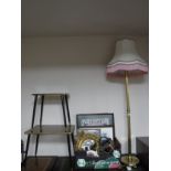 A brass standard lamp with shade together with a nest of two tables and box of framed needlework,