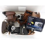 A Zeiss Ikon folding camera Novar Anastigmat 105mm together with other vintage cameras by Iflord,