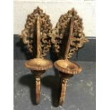 A pair of cast iron garden wall sconces