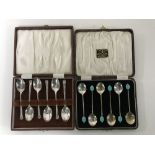 A set of six cased silver plated Art Deco teaspoons and another set of six teaspoons