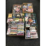 Eight boxes containing assorted DVD's and CD's