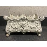 A 20th century cast iron Louis XV style lion mask planter