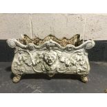 A 20th century cast iron Louis XV style lion mask planter