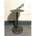 A cast iron pedestal sundial