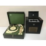 A mid 20th century electric table top World Record Club record player together with a vintage Pye