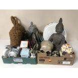 Two boxes containing rope boat buoys, cutlery, fishing reel, skull ornaments, figures,