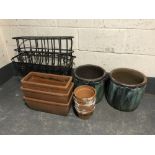 Three metal plant troughs together with assorted terracotta and glazed pottery planters