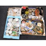 Three boxes containing assorted tea china, figurines, storage jars, vintage tins,