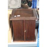 An Edwardian mahogany double door cabinet fitted four drawers