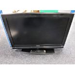 A Humax 32" LCD TV with lead,