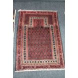 A Persian prayer rug