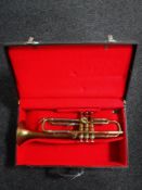 A Boosey and Hawkes brass trumpet in case,