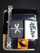 A tray of assorted boxed costume jewellery