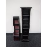 Two sets of CD storage shelves in the form of a piano keyboard and a cello case