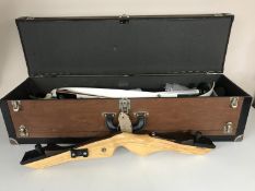 A Merlin take-down archery bow and arrow in fitted box