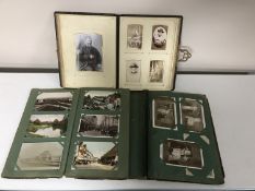 A Victorian photo album together with two Victorian postcard albums