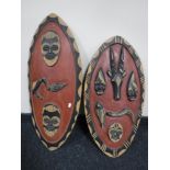 Two hand painted tribal shields