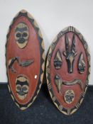 Two hand painted tribal shields