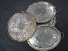 Three antique plated twin handled serving trays together with a plated gallery tray