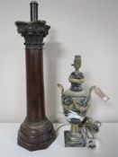 A mahogany Corinthian column table lamp together with an ornate brass and marble table lamp