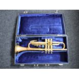 A brass Lafleur trumpet in case,