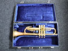 A brass Lafleur trumpet in case,