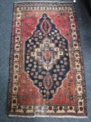 An old Baluchi rug 146 cm x 87 cm