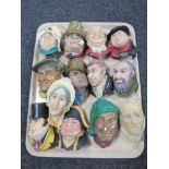 A tray of thirteen Bossons wall plaques - Dickens characters etc