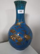 A late 19th century blue glazed Chinese vase with gilded decoration (stapled)