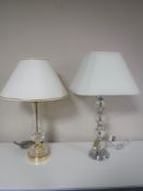 A lead crystal table lamp with shade together with a contemporary table lamp