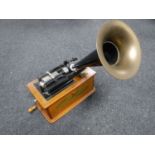 A reproduction classic home phonograph with horn