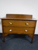 A 20th century oak two drawer chest