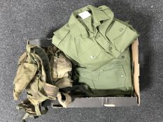 A box of ten military olive shirts together with a small quantity of webbing