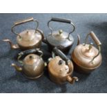 Five antique copper kettles
