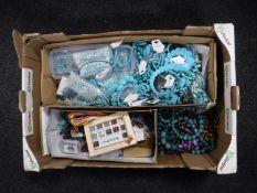 A box of a quantity of costume jewellery,