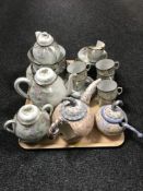 A Japanese eggshell tea service together with a Morgan Hall pottery teapot and sugar basin