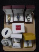 A tray of four boxed Citizen wristwatches together with two lady's boxed Pulsar wristwatches