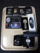 A tray containing five assorted boxed gent's wristwatches together with four contemporary pocket