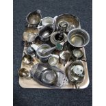 A tray of twentieth century plated wares, tankards, part tea sets, egg cups,