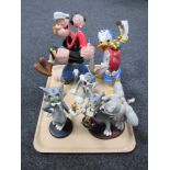 A tray of five contemporary figures, Donald Duck,