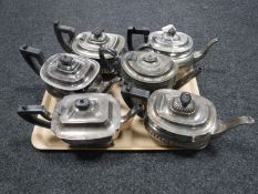 A tray of six antique plated teapots