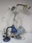 Two mid twentieth century angle poise lamps together with a desk lamp,